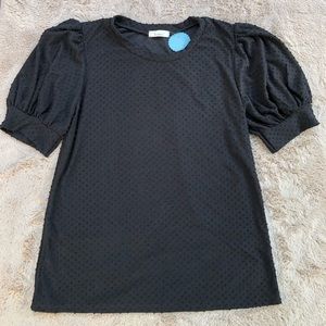 New with tags! Black short sleeve top with black dots.